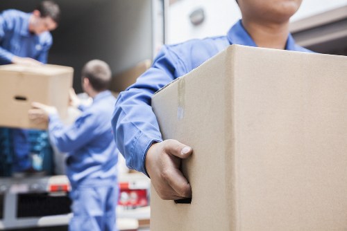 Removal van and moving team preparing for a house move in Streatham