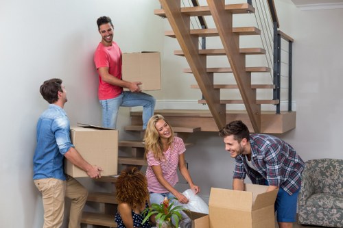 Mover loading furniture safely into a van