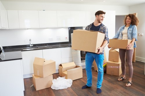 Professional movers handling office furniture in Streatham