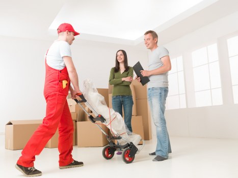 Local removal van loading furniture for Streatham customers