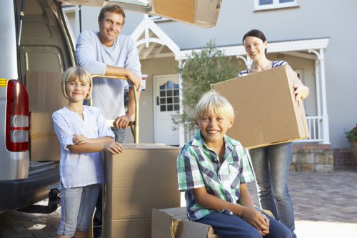 Customer and moving team discussing booking changes