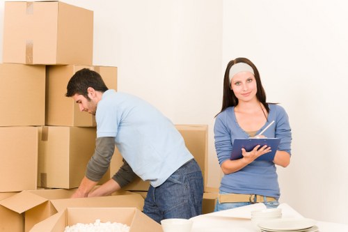 Van loading boxes and household items for a Streatham move
