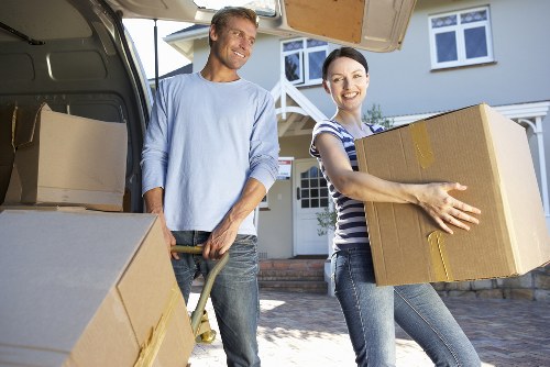 Professional movers loading a van for a Streatham home move