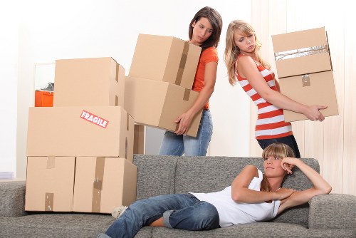 Packed moving boxes and furniture ready for a Streatham relocation