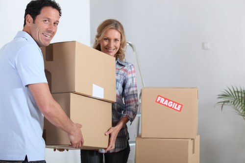 Office boxes, furniture, and equipment arranged for a Streatham business move